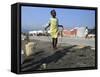 Youth Jumps Rope in a Camp for People Displaced by the Earthquake in Port-Au-Prince-null-Framed Stretched Canvas