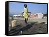 Youth Jumps Rope in a Camp for People Displaced by the Earthquake in Port-Au-Prince-null-Framed Stretched Canvas