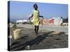 Youth Jumps Rope in a Camp for People Displaced by the Earthquake in Port-Au-Prince-null-Stretched Canvas