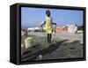 Youth Jumps Rope in a Camp for People Displaced by the Earthquake in Port-Au-Prince-null-Framed Stretched Canvas