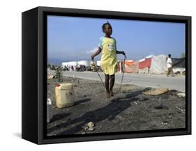 Youth Jumps Rope in a Camp for People Displaced by the Earthquake in Port-Au-Prince-null-Framed Stretched Canvas