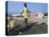 Youth Jumps Rope in a Camp for People Displaced by the Earthquake in Port-Au-Prince-null-Stretched Canvas