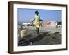 Youth Jumps Rope in a Camp for People Displaced by the Earthquake in Port-Au-Prince-null-Framed Photographic Print