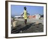 Youth Jumps Rope in a Camp for People Displaced by the Earthquake in Port-Au-Prince-null-Framed Photographic Print