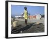 Youth Jumps Rope in a Camp for People Displaced by the Earthquake in Port-Au-Prince-null-Framed Photographic Print