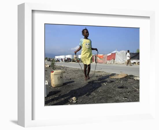 Youth Jumps Rope in a Camp for People Displaced by the Earthquake in Port-Au-Prince-null-Framed Photographic Print