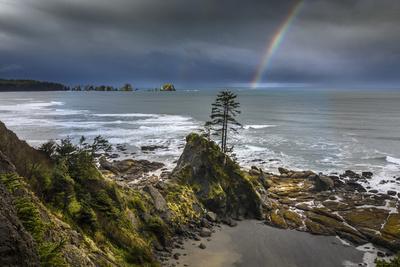 USA, Washington State, Olympic Peninsula. Shi Shi Beach, Rainbow over Point of the Arches.