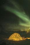 Churchill, Manitoba, Canada. Northern Lights shine above lit igloo.-Yvette Cardozo-Photographic Print