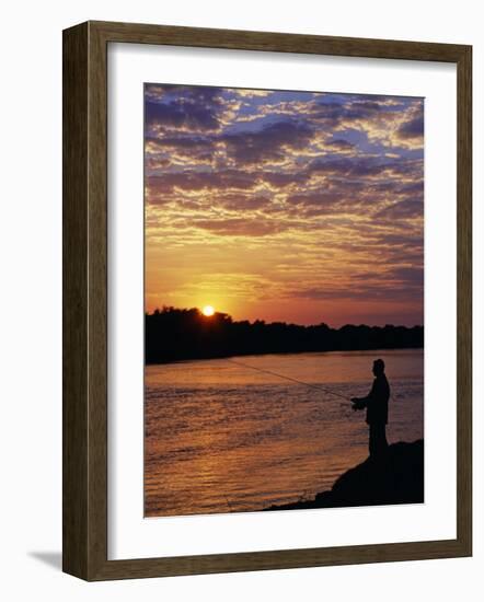 Zambezi National Park, Sausage Tree Camp, Fly-Fishing for Tiger Fish at Sunset on River, Zambia-John Warburton-lee-Framed Photographic Print