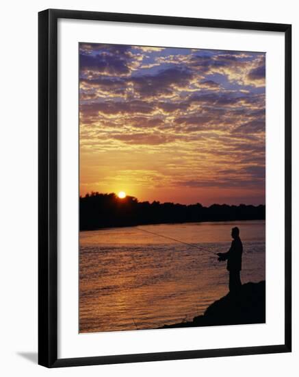 Zambezi National Park, Sausage Tree Camp, Fly-Fishing for Tiger Fish at Sunset on River, Zambia-John Warburton-lee-Framed Photographic Print