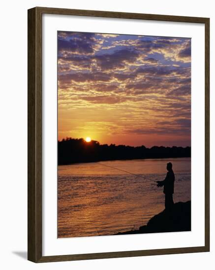 Zambezi National Park, Sausage Tree Camp, Fly-Fishing for Tiger Fish at Sunset on River, Zambia-John Warburton-lee-Framed Photographic Print