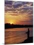 Zambezi National Park, Sausage Tree Camp, Fly-Fishing for Tiger Fish at Sunset on River, Zambia-John Warburton-lee-Mounted Photographic Print