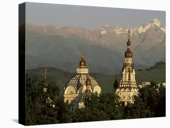 Zenkov Cathedral and Tien Shan Mountains, Almaty, Kazakhstan, Central Asia-Upperhall-Stretched Canvas