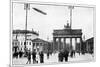 Zeppelin Airship Passing over Brandenburg Gate, Berlin, First World War, 1914-null-Mounted Giclee Print