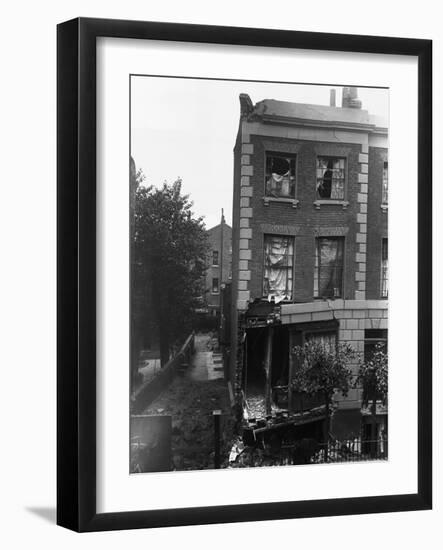Zeppelin Damage in Shoreditch, London, UK-null-Framed Photographic Print