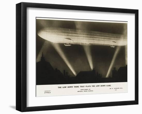 Zeppelin Illuminated by Searchlights-null-Framed Photographic Print