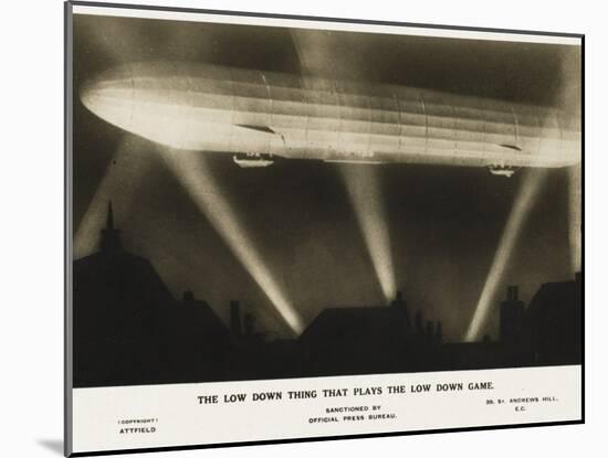 Zeppelin Illuminated by Searchlights-null-Mounted Photographic Print