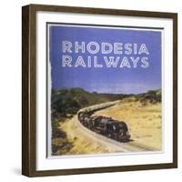 Zimbabwe : a Massive Steam Locomotive Hauls a Long Train across Rhodesia's Wide Open Spaces-null-Framed Photographic Print