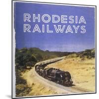 Zimbabwe : a Massive Steam Locomotive Hauls a Long Train across Rhodesia's Wide Open Spaces-null-Mounted Photographic Print