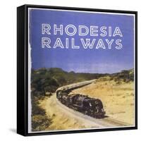 Zimbabwe : a Massive Steam Locomotive Hauls a Long Train across Rhodesia's Wide Open Spaces-null-Framed Stretched Canvas