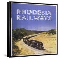 Zimbabwe : a Massive Steam Locomotive Hauls a Long Train across Rhodesia's Wide Open Spaces-null-Framed Stretched Canvas