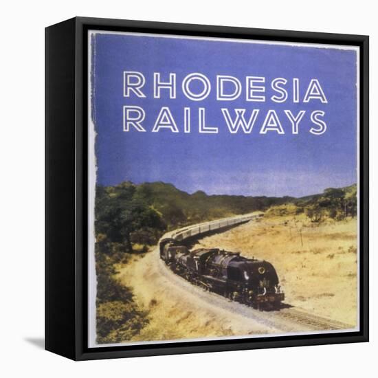 Zimbabwe : a Massive Steam Locomotive Hauls a Long Train across Rhodesia's Wide Open Spaces-null-Framed Stretched Canvas