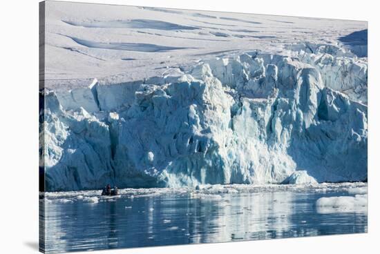 Zodiac with tourists cruising in front of a huge glacier, Hope Bay, Antarctica, Polar Regions-Michael Runkel-Stretched Canvas