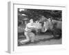 Zookeeper Giving Hippo Bundle of Hay-null-Framed Photographic Print