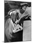 Zookeeper Rubbing a Hippotomus's Gums at the Brookfield Zoo-William Vandivert-Mounted Photographic Print