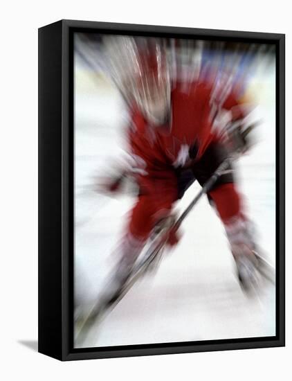 Zoom Explosion View of Ice Hockey Player-Paul Sutton-Framed Stretched Canvas