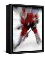 Zoom Explosion View of Ice Hockey Player-Paul Sutton-Framed Stretched Canvas