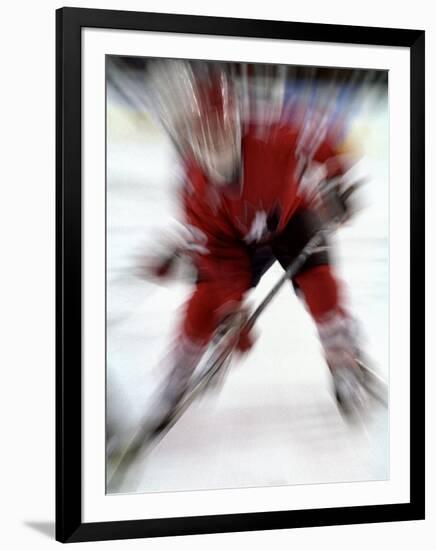 Zoom Explosion View of Ice Hockey Player-Paul Sutton-Framed Photographic Print