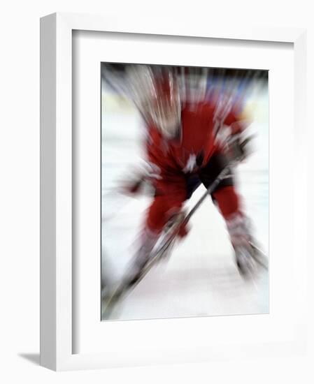 Zoom Explosion View of Ice Hockey Player-Paul Sutton-Framed Photographic Print