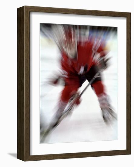 Zoom Explosion View of Ice Hockey Player-Paul Sutton-Framed Photographic Print