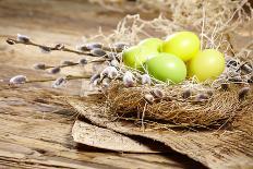 Easter Basket with Easter Eggs on Wooden Background.-ZoomTeam-Photographic Print