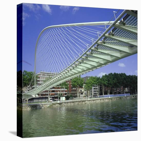 Zubizuri Curved Pedestrian Bridge Over Bilbao River, Bilbao, Pais Vasco (Vizcaya), Spain, Europe-Christopher Rennie-Stretched Canvas