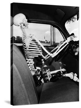 '1930s-1940s Still Life of Skeleton Driving Car with Whiskey Bottle and