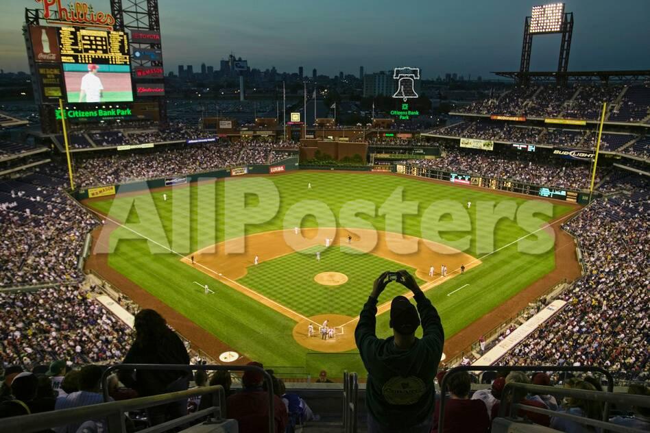 A Fan With A Digital Camera Taking A Panoramic Image Of Citizens