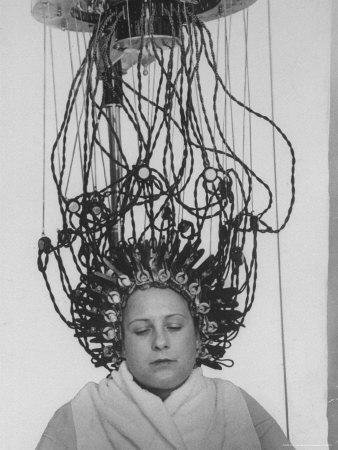 Woman at Hairdressing Salon Getting a Permanent Wave 