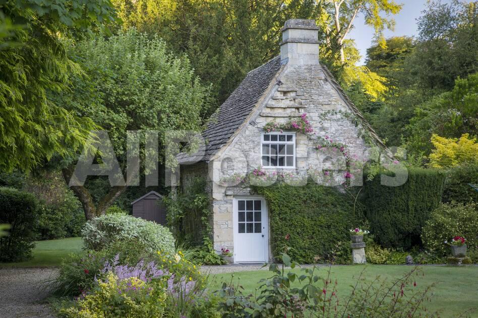Early Morning Cottage In Castle Combe Wiltshire England