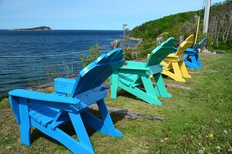 Four Adirondack Chairs Facing the Atlantic Ocean on Middle 