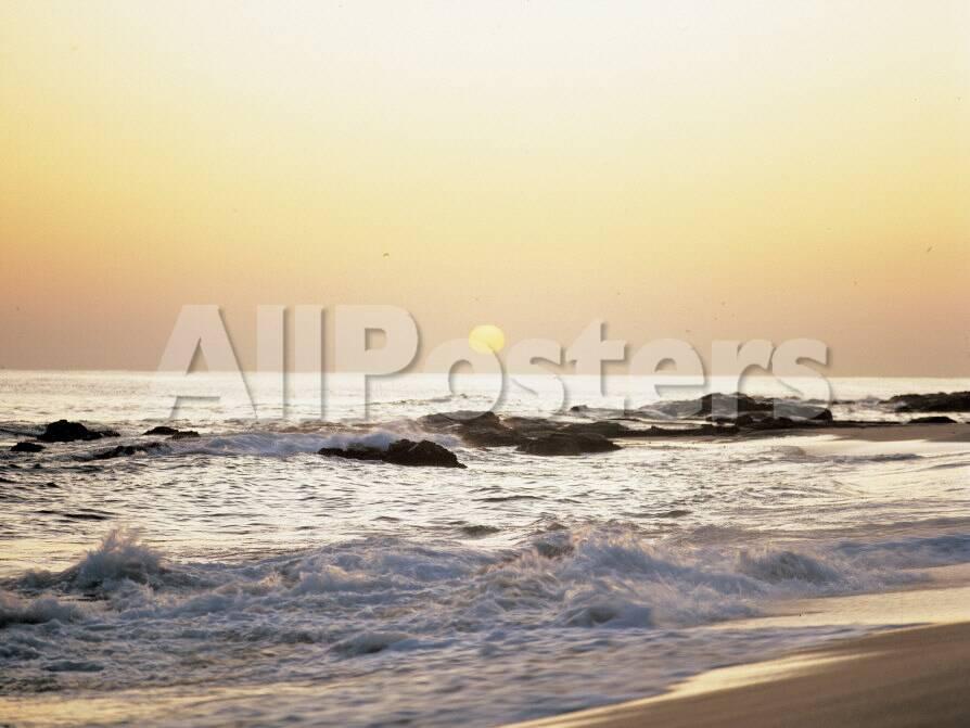 Peaceful Sunset Over Waves Lapping In A Sea Photographic Print Allposters Com
