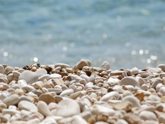 stones pebbles sea beach