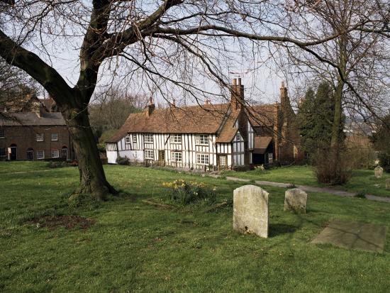 Half Timbered Cottages In The Church Graveyard At Old Hatfield