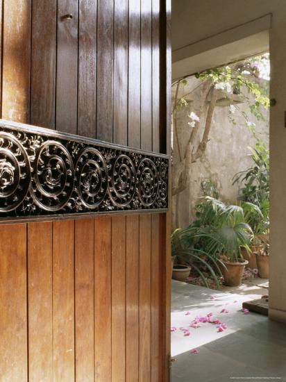 A Modern Front Door Decorated With A 400 Year Old Piece Of Wood