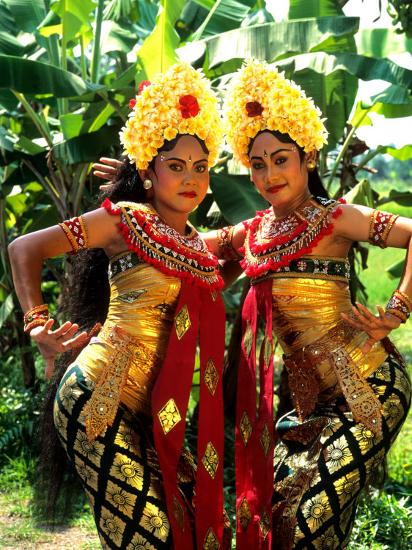 Golden Dancers in Traditional Dress Bali Indonesia 