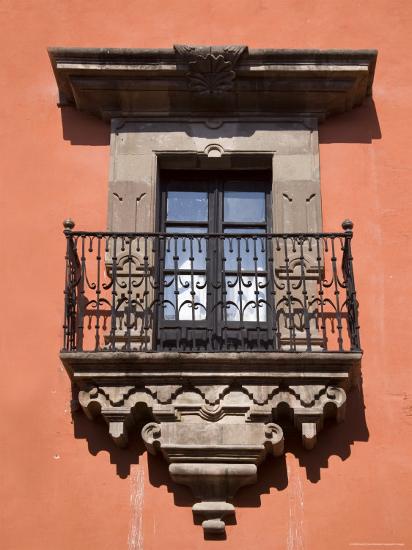 French Doors And A Wrought Iron Balcony In A Building San Miquel