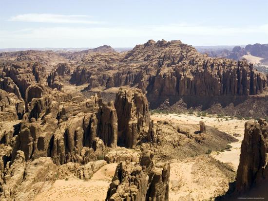 The Rugged Landscape Deep In The Ennedi Mountains Northeastern Chad Photographic Print Michael Fay Allposters Com