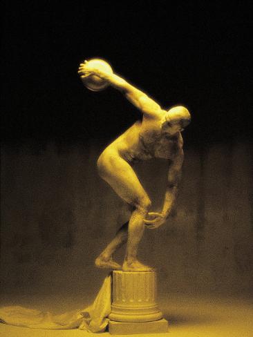 Nude Man Painted Gold Posing As A Statue