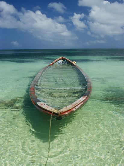 A Boat Submerged In Crystal Clear Water Photographic Print By Bill